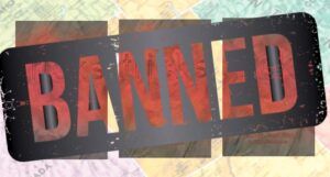 image of the book tricks underneath the word "banned," which is in black.